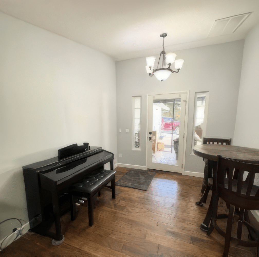 Freshly painted interior living space with light grey walls